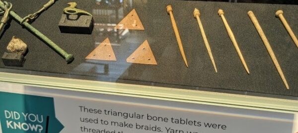 Three bone braid tablets on display in the Malton Museum.