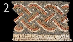 A section of Roman mosaic with a guilloche pattern: this pattern resembles platted strings or woven willow - in this example each strand has three light coloured stirpes between two dark coloured stripes, giving it a strong visual impact