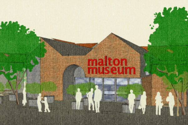 A brick built architect's image of a new museum, with an arched entrance, glass fronted section and 'Malton Museum' written in red letters.