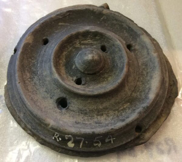 A metal Roman Cheese Press with drainage holes discovered in Crambeck near Malton.