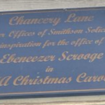 A plaque with gold text on a blue background