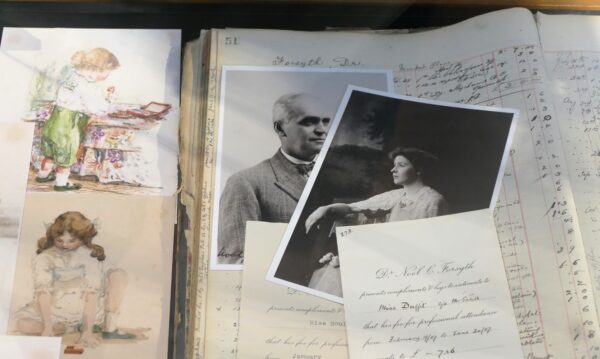 black and white photographs in a journal